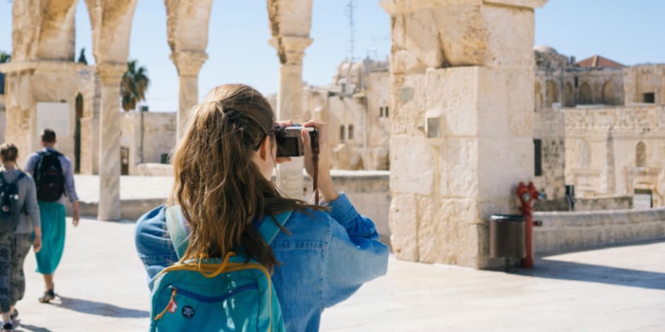 Tourist takes a sightseeing stroll and take pictures amid the upturn in the travel sector